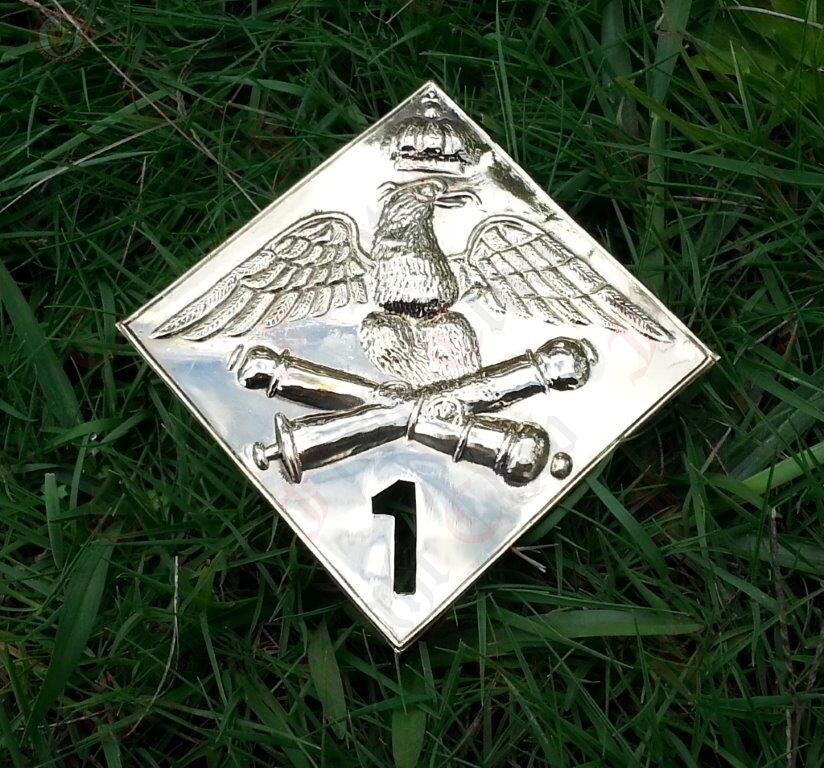 shako plate on grass