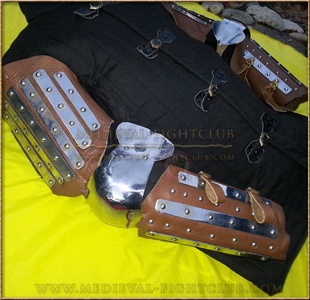 Banded leather 14thC arm guards - (splint armour)