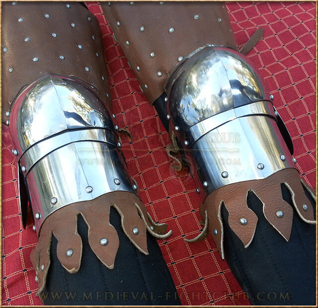 Banded leather 14thC leg guards - (splint armour)