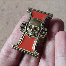inquisition pin in hand
