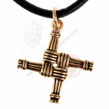 front of bronze cross pendant